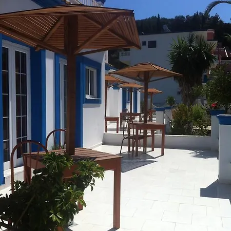 Akis * Corfu (city)